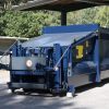APB 1620 portable waste compactor outside blue colour